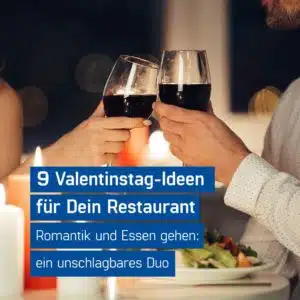 Verliebtes Pärchen stößt beim Candle Light Dinner zum Valentinstag in der Gastronomie mit Rotwein an, Valentinstag Gastronomie