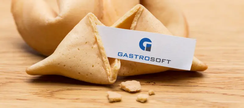 Kassensystem chinesisch - Glückskekse auf einem Tisch mit GastroSoft Logo als Spruch